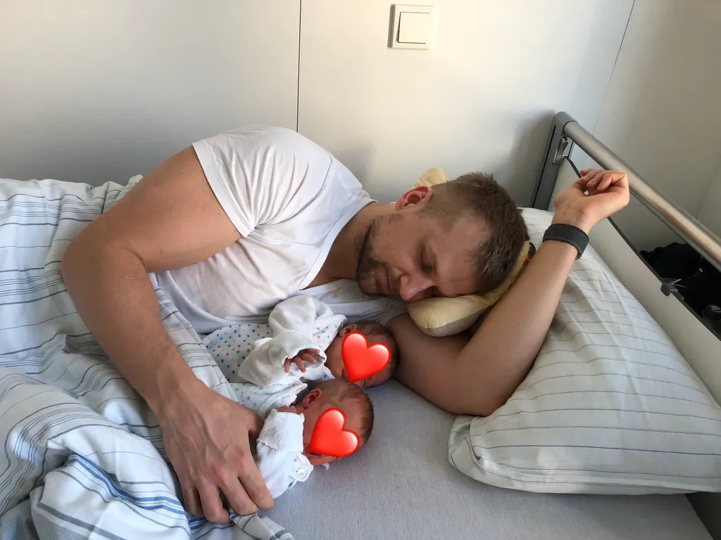 Twin daughters smiling